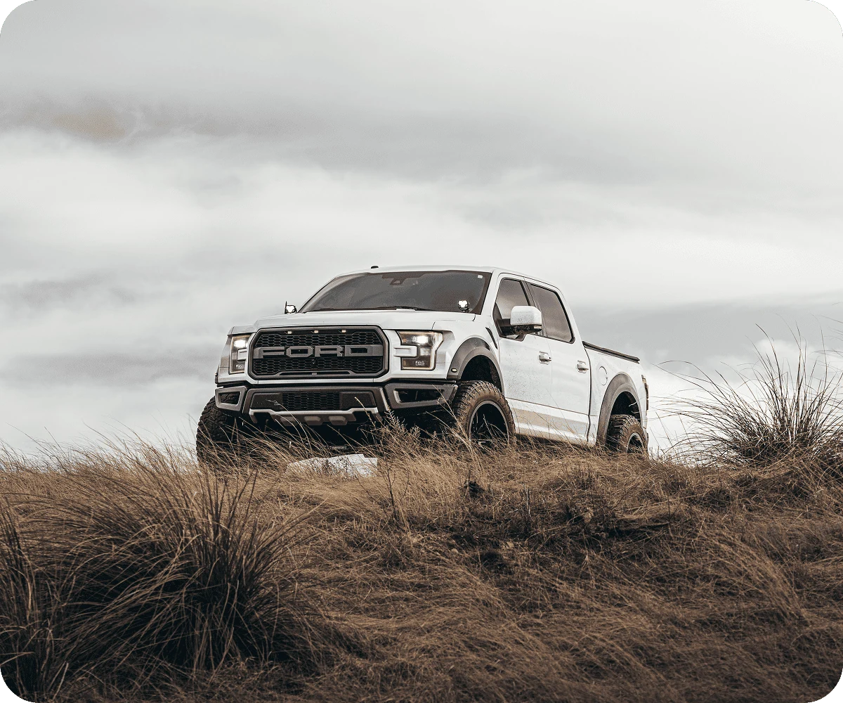Pickup truck on an open hillside